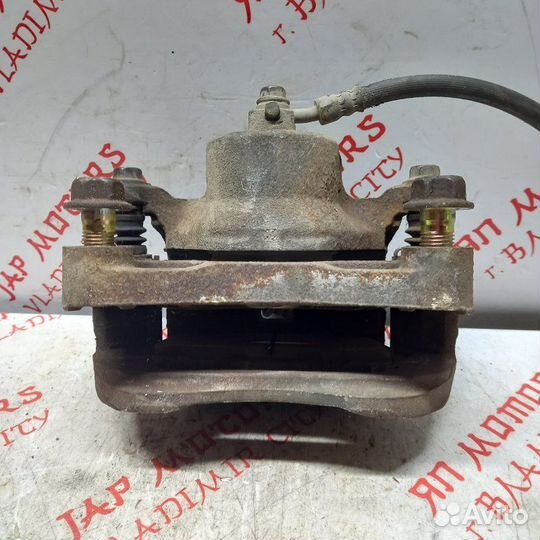 Суппорт тормозной передний правый Nissan Teana J31