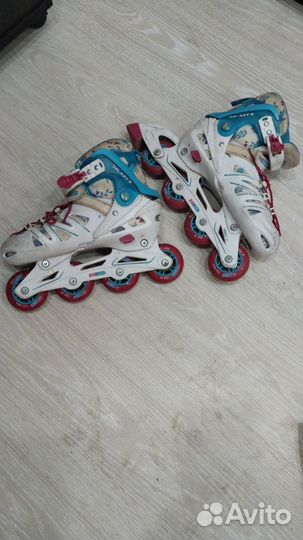 Роликовые коньки