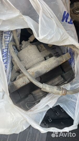 Супорт в сборе с дисками