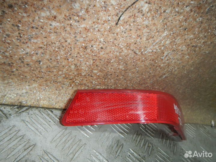 Отражатель в бампер задний левый, Nissan (Ниссан)