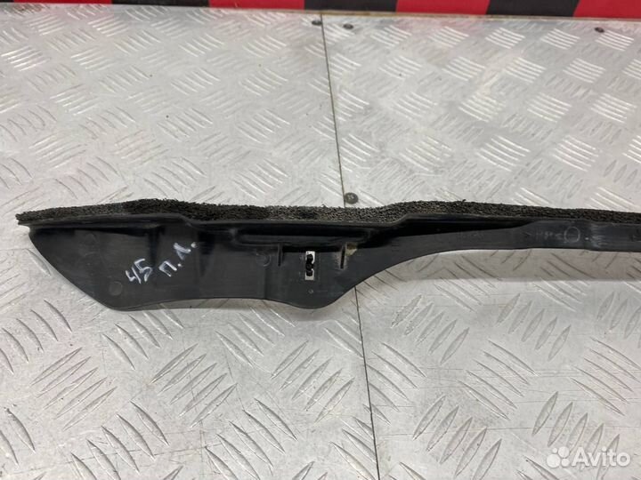 Б/У пыльник крыла передний левый Mazda Demio 2