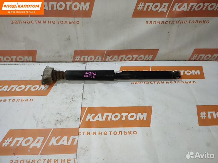 Стойка амортизатора задняя Mazda 3 BL рест. 2012