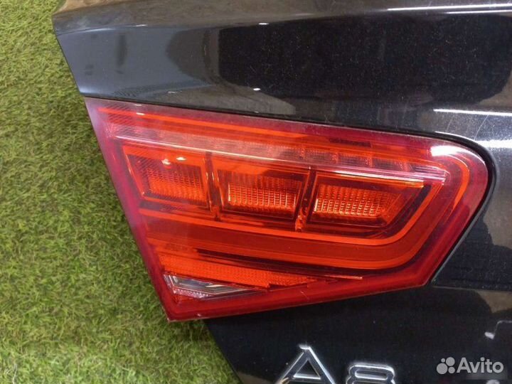 Фонарь в крышку багажника левый Audi A8 D4