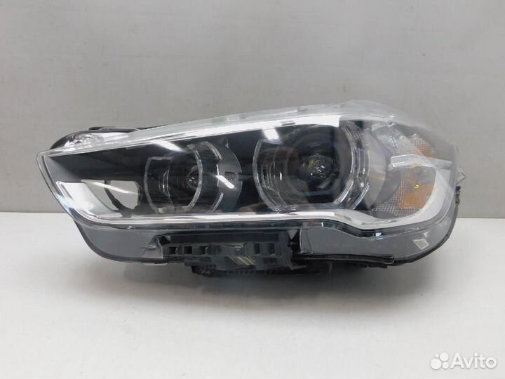 Фара левая BMW X1