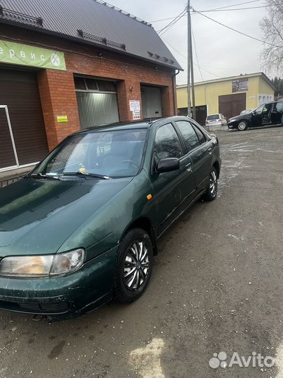 Nissan Almera 1.6 AT, 1998, 335 354 км