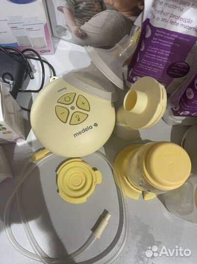 Молокоотсос medela электрический swing flex
