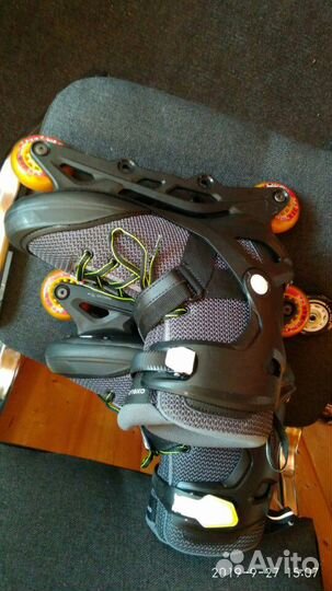 Роликовые коньки