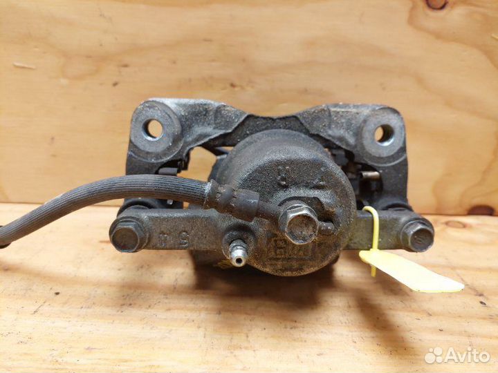 Суппорт передний правый Toyota Vitz KSP90 1krfe