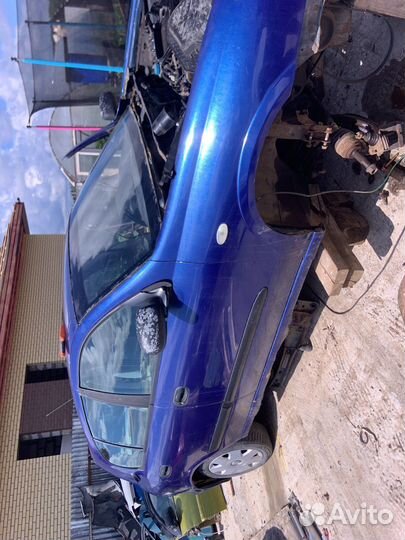 Двери Nissan Almera 2001год