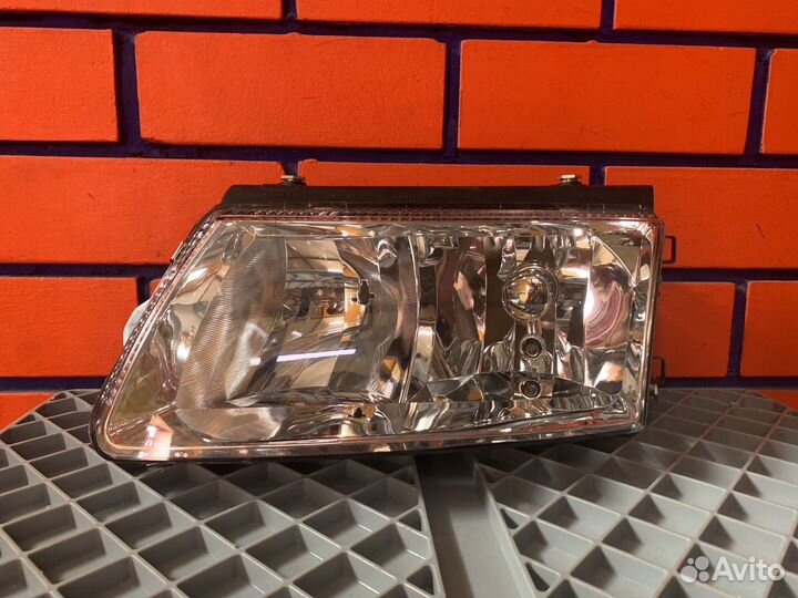 Передняя левая фара Volkswagen Passat B5