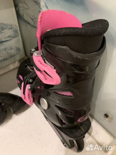 Роликовые коньки