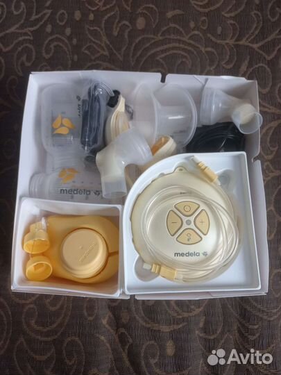 Молокоотсос medela