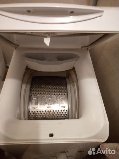 Стиральная машина с вертикальной загрузкой