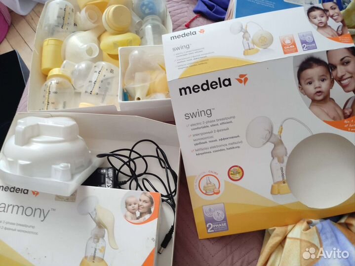 Молокоотсос medela электрический