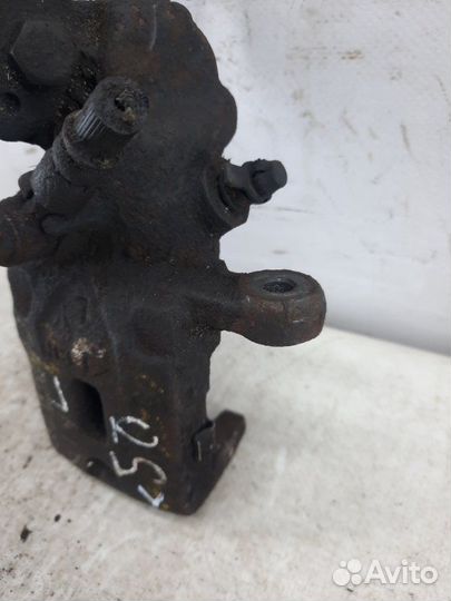 Суппорт тормозной задний левый Kia Cerato хэтчбэк