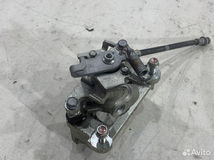 Суппорт задний левый Мitsubishi Оutlаndеr