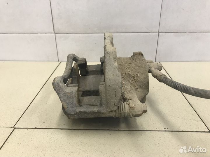 Суппорт передний правый Primera P12E 2002-2007