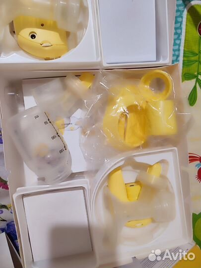 Молокоотсос medela электрический