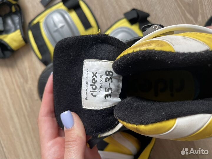 Роликовые коньки