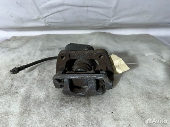 Суппорт тормозной задний правый Volvo S80 AS40