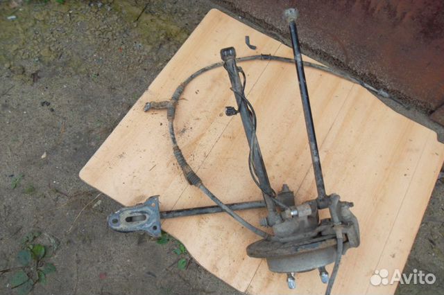 Поворотный кулак правый Шевроле Лачетти задний