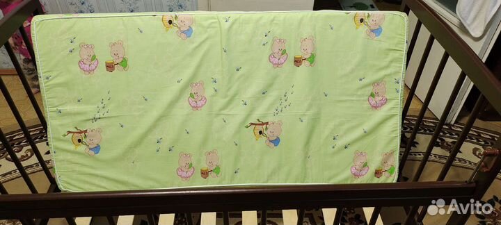 Детская кроватка с поперечным маятником