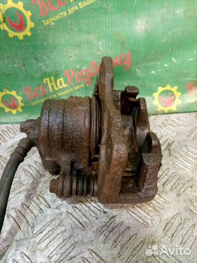 Суппорт передний левый Nissan Almera N 15 1.4 GAL