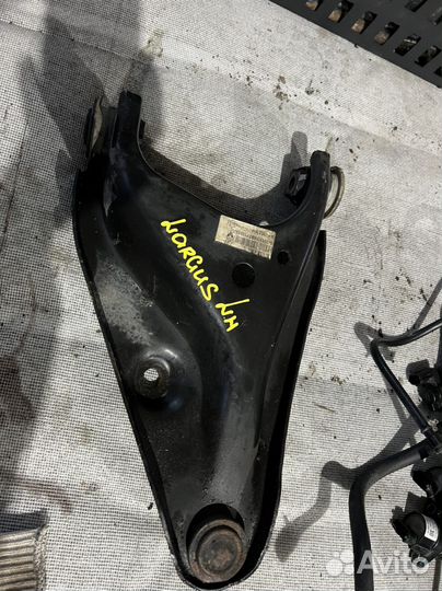 Рычаг передний Largus Almera G15