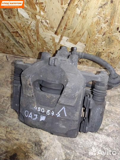 Суппорт тормозной передний левый Opel Astra J