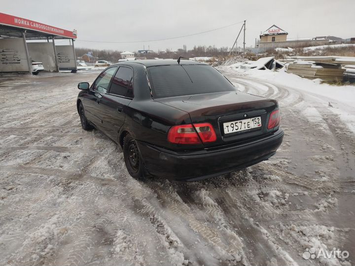 Бампер передний Мицубиси Каризма рестайлинг