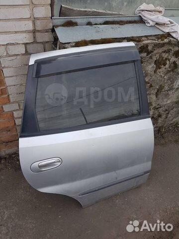 Задняя левая дверь на Nissan Almera Tino 2001 года