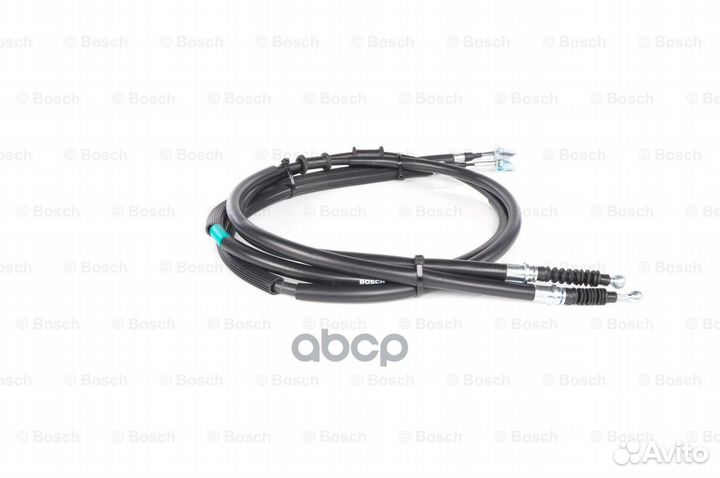 Трос ручника посередине Opel Astra