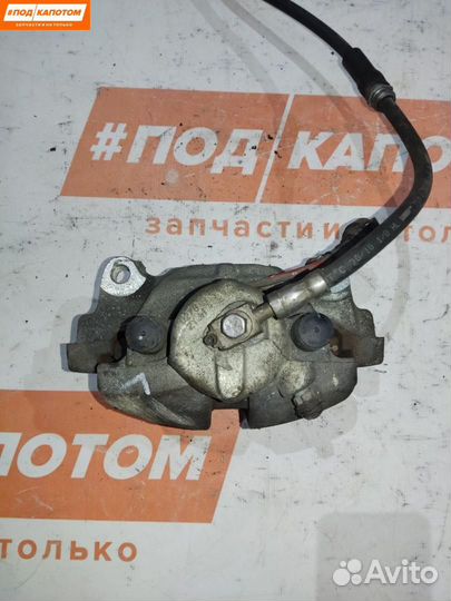 Суппорт тормозной передний левый Volkswagen Golf 6