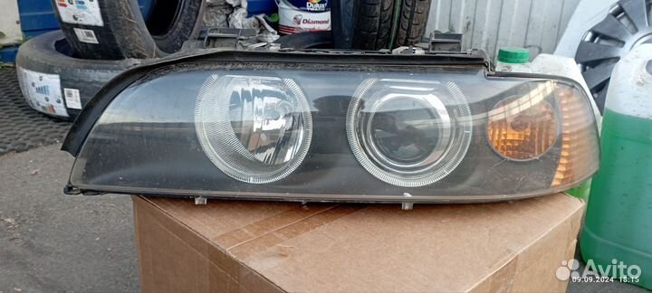Фара левая BMW E39 рестайлинг Hella