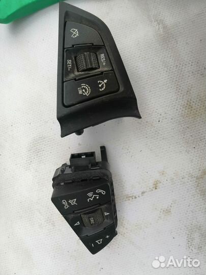 Кнопи рулевого колеса Opel Astra J