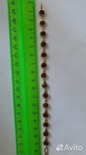 Золотой браслет с гранатами