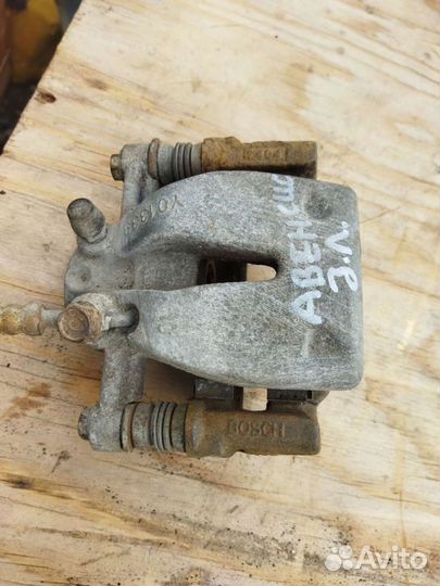 Суппорт тормозной задний Тойота Авенсис 250