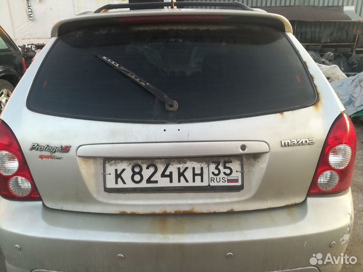 Дверь багажника Mazda Protege