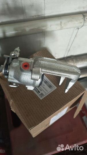 Супорт правый задний на додж грант караван 5