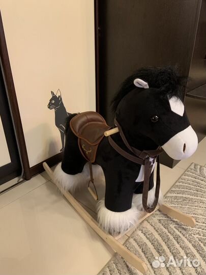 Конь качалка