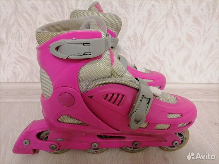 Роликовые коньки