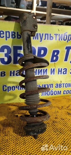 Стойка амортизатора переднего правого Renault Loga