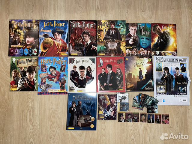 Заполненные альбомы Гарри Поттер и твари Роулинг