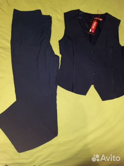 Школьный комплект жилетка+брюки,на рост 142-148