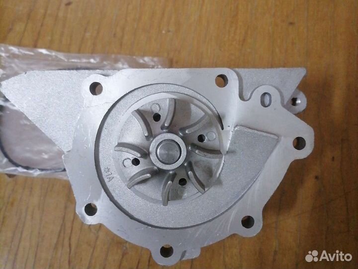 Помпа водяная Peugeot, Citroen передняя часть