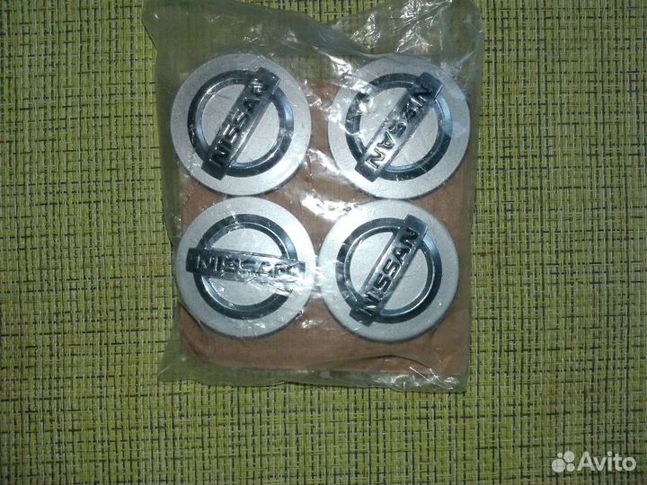 Заглушки на литые диски Nissan 40342BC400 4шт