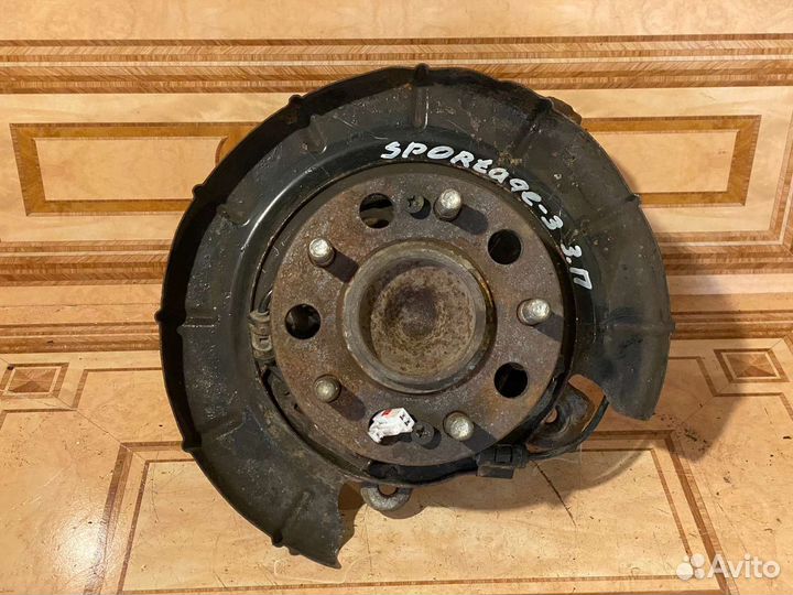 Задний поворотный кулак правый Kia Sportage 3