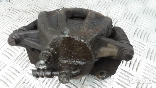 Суппорт тормозной передний левый toyota corolla ve