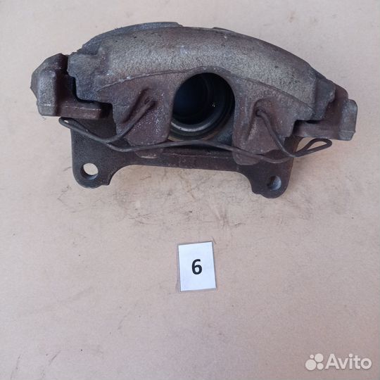 Суппорт тормозной передний правый VW Passat B6