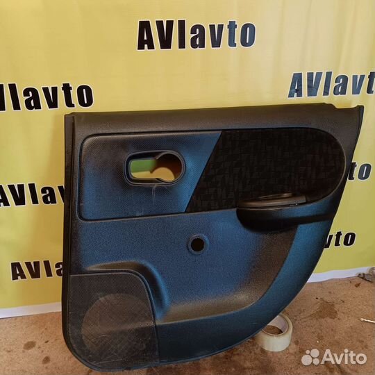 Обшивка двери Nissan Note 11